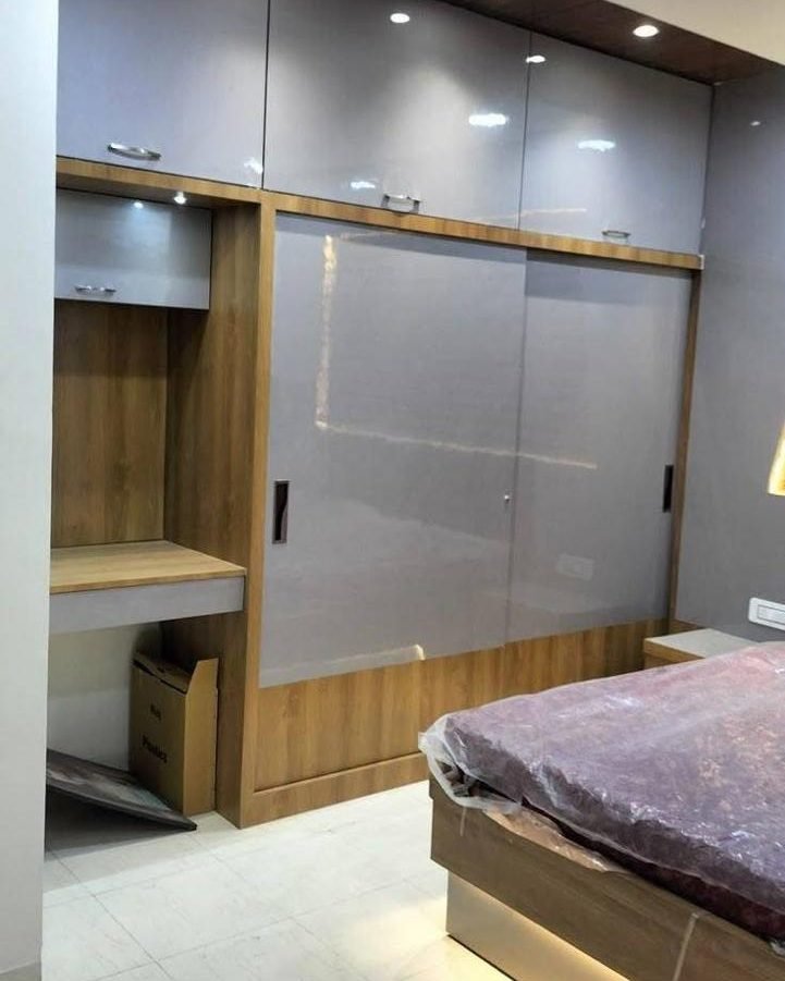 Bedroom with a fitted sliding wardrobe