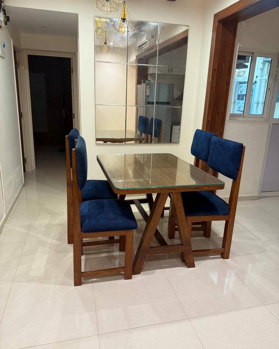 Dining table with upholstered chairs