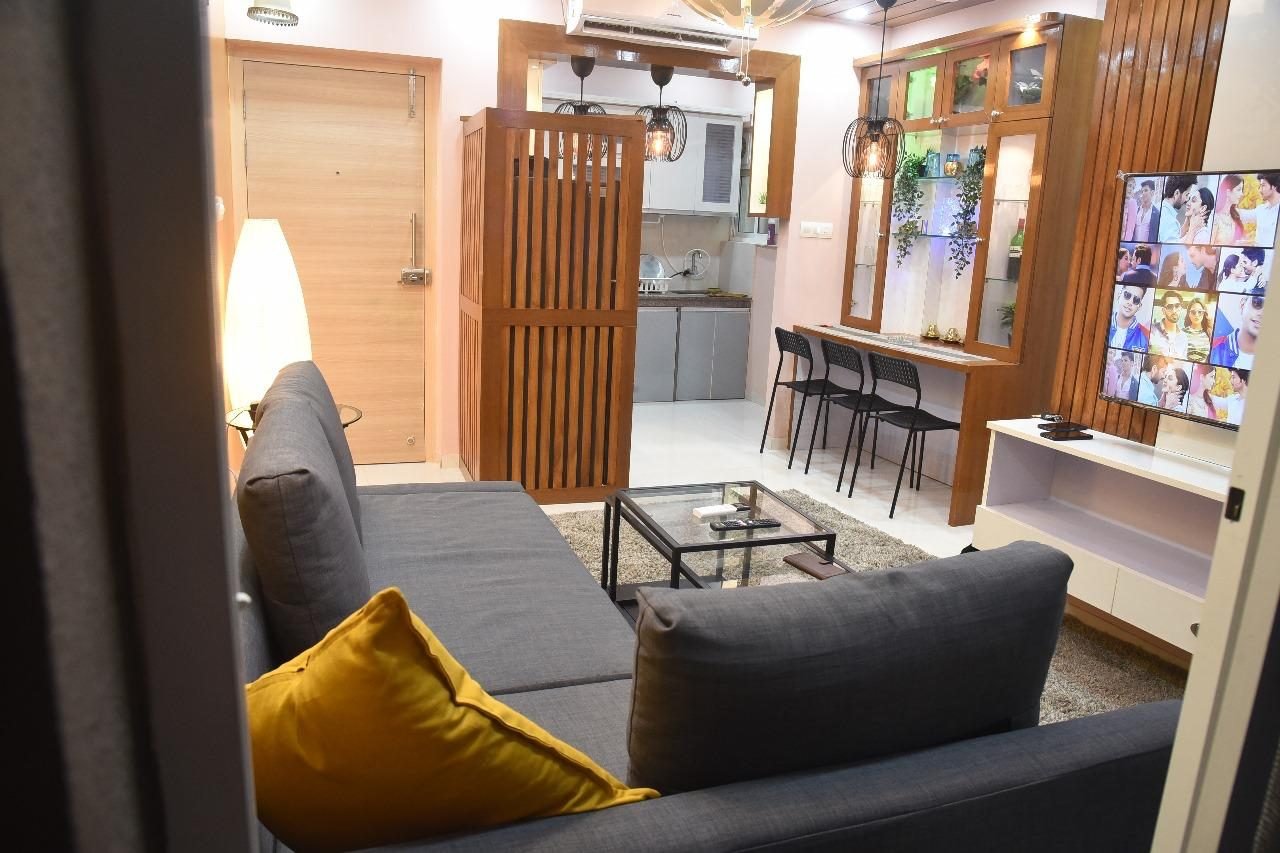 Living room opening to a breakfast counter